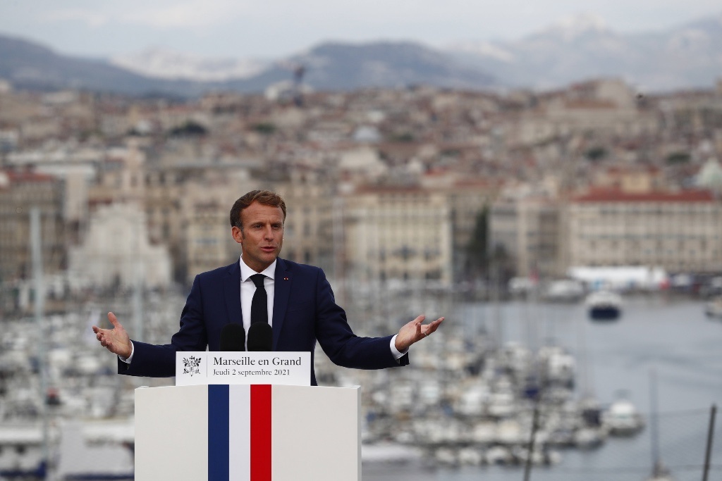 Macron promises hundreds of surveillance cameras to district ruled by drug gangs