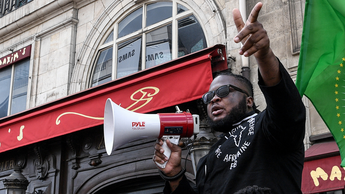 Police arrest leader of recently disbanded racist group – video